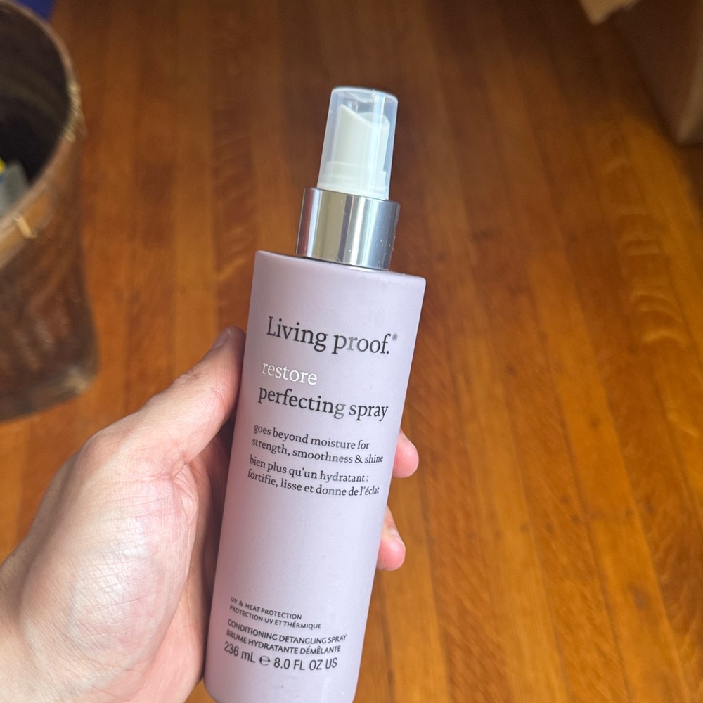 Pair of Living Proof Restore Perfecting Spray in Light Purple